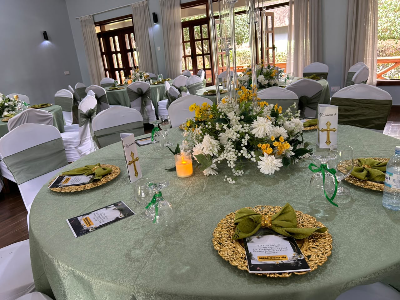 Dream Events ceremony setup with layered floral decor