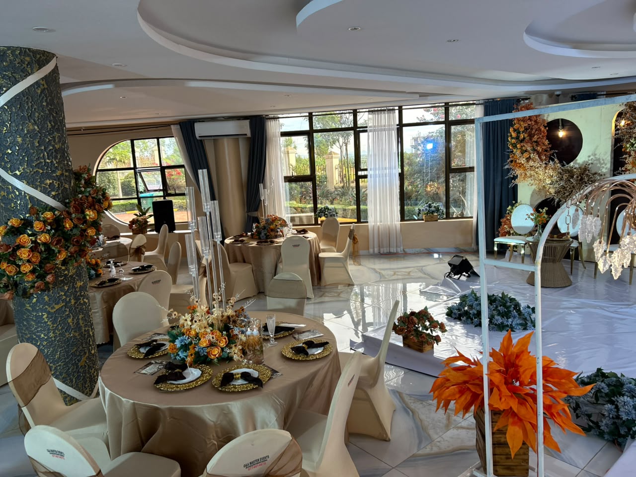 Dream Events ceremony setup with layered floral decor