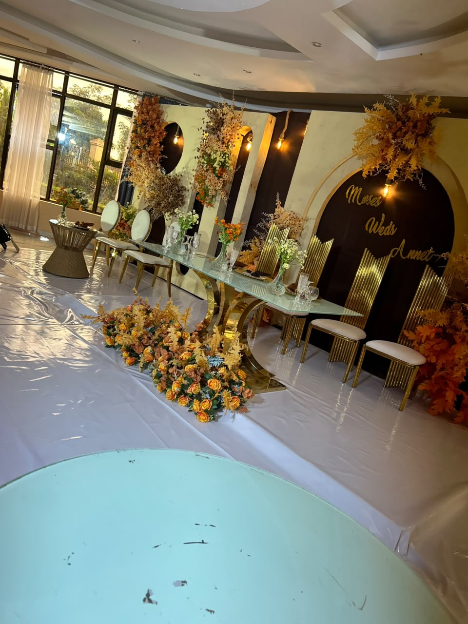 Dream Events ceremony setup with layered floral decor