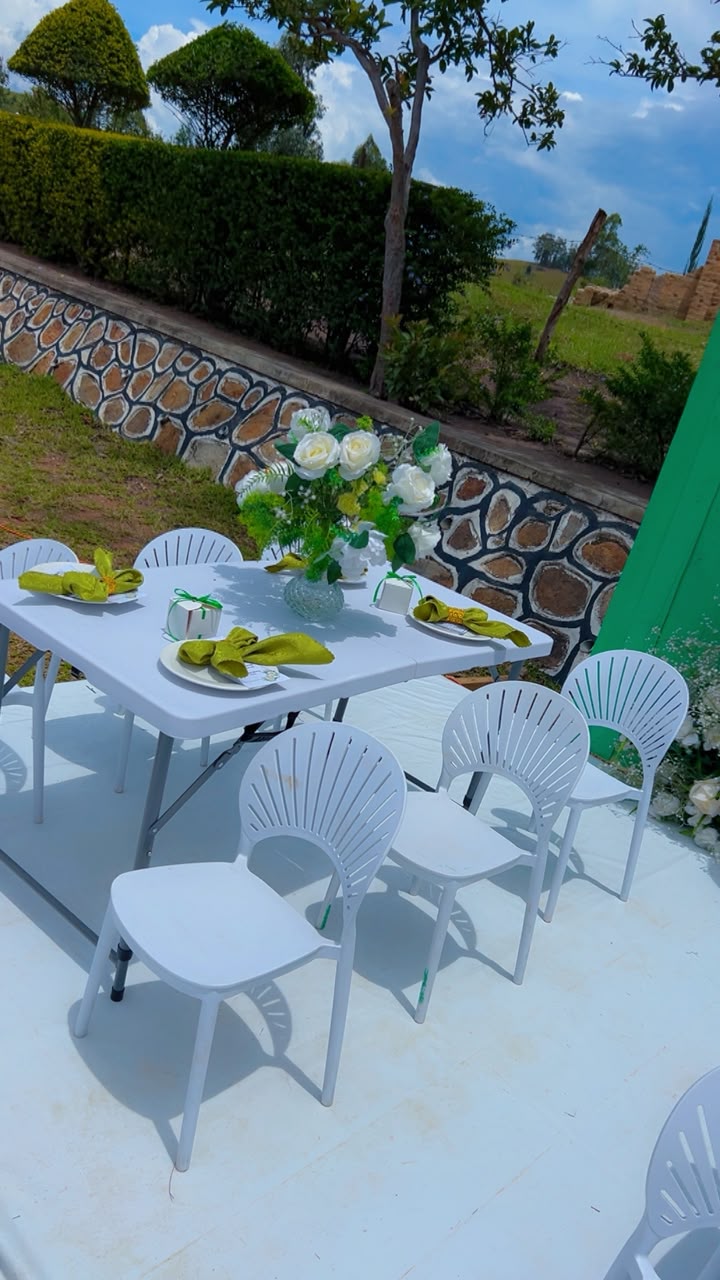 Dream Events ceremony setup with layered floral decor