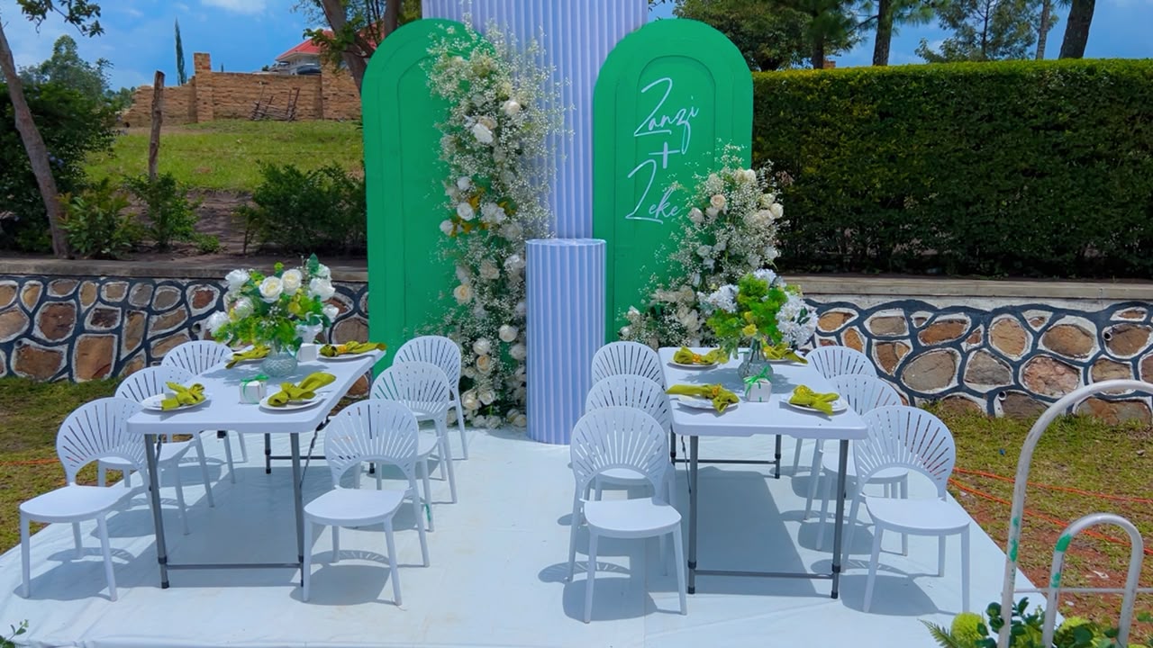 Dream Events ceremony setup with layered floral decor