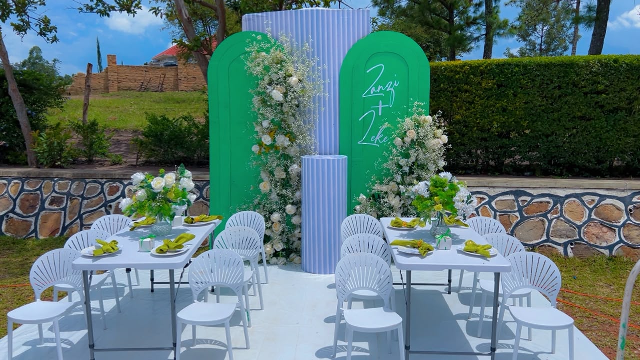 Dream Events ceremony setup with layered floral decor
